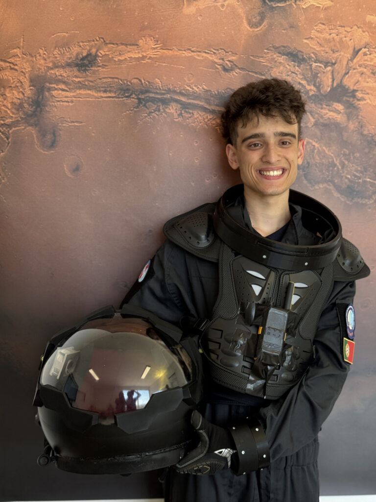 Student with space suit and helmet