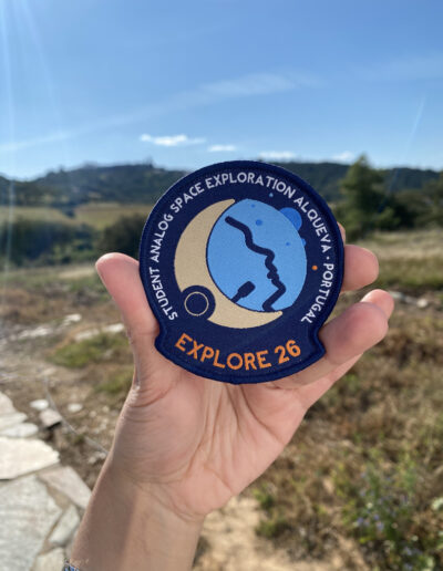 EXPLORE-2 badge